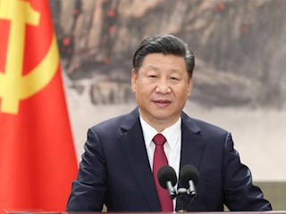 以习近平同志为核心的党中央引领中国特色社会主义进入新时代