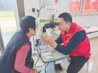 健康义诊进乡村 医保政策暖人心